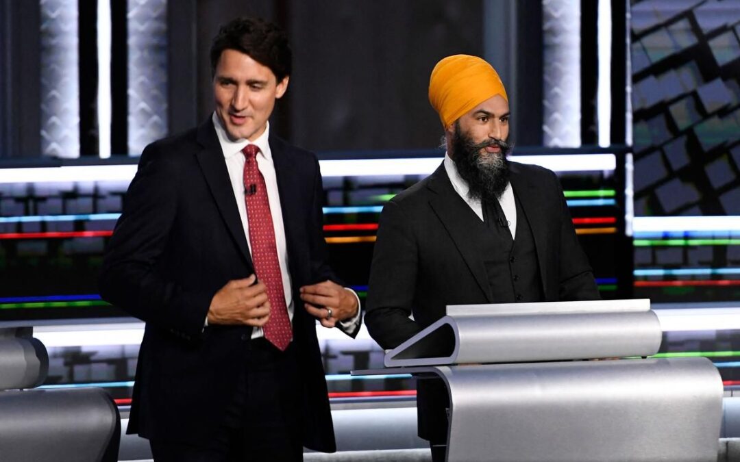 Liberal Leader Justin Trudeau and NDP Leader Jagmeet Singh get ready for the start of the federal election English-language leaders’ debate in Gatineau, Quebec on September 9, 2021.